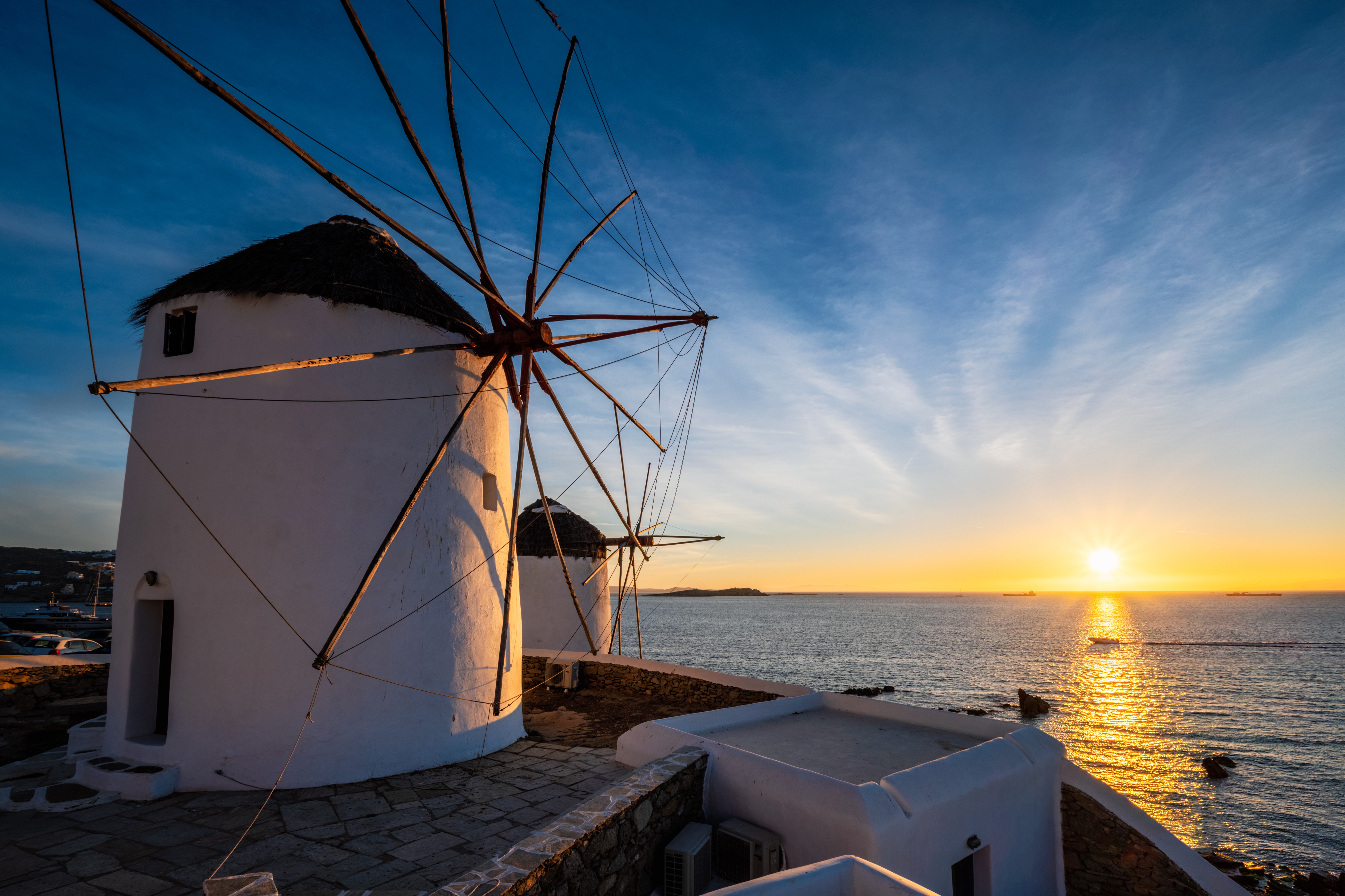 Overnight on board in port to experience the cosmopolitan charm of Mykonos by day and by night