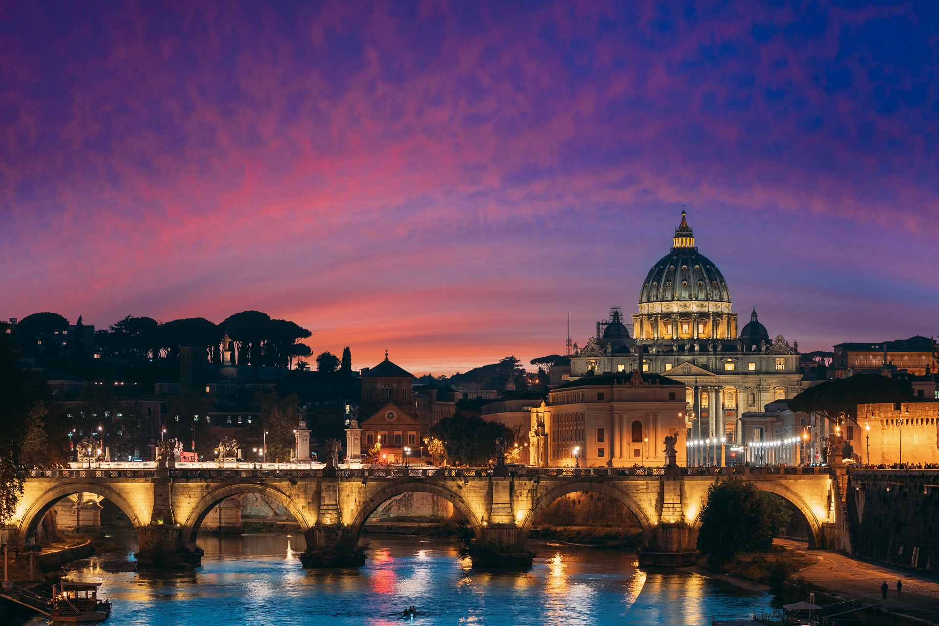 St Peters Basilica and River Tiber in Rome at dusk