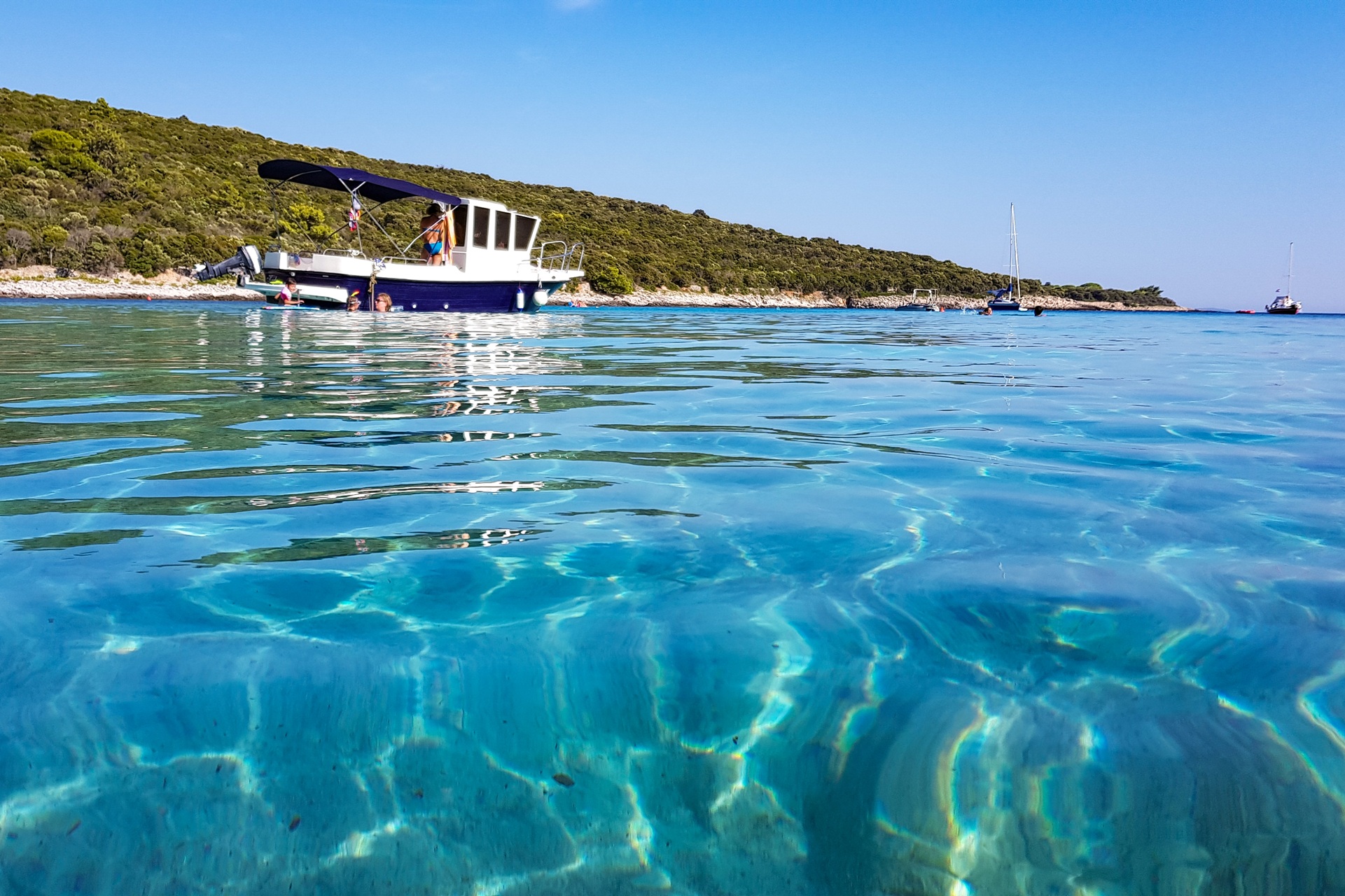 Greek boats moored in a bay